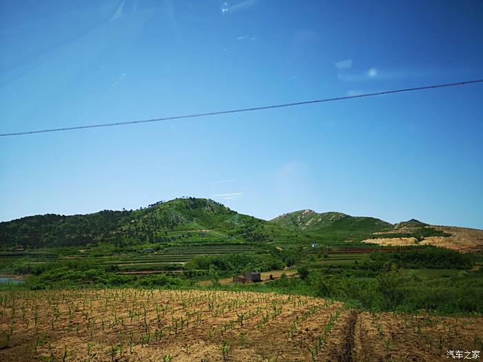 經過兩個小時,終於看到目的地——青島錢穀山有機山莊