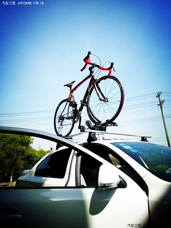 想在车顶上装架子放自行车,这样要处罚么?