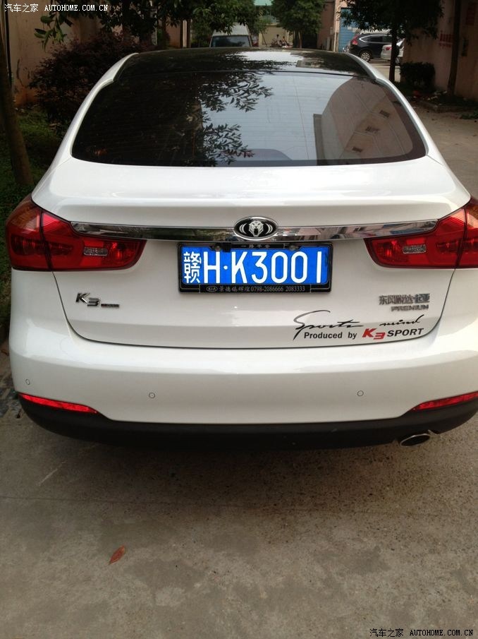 瓷都景德镇k3白色1.6p版 来认证了附上美女照片,版主加精啊.