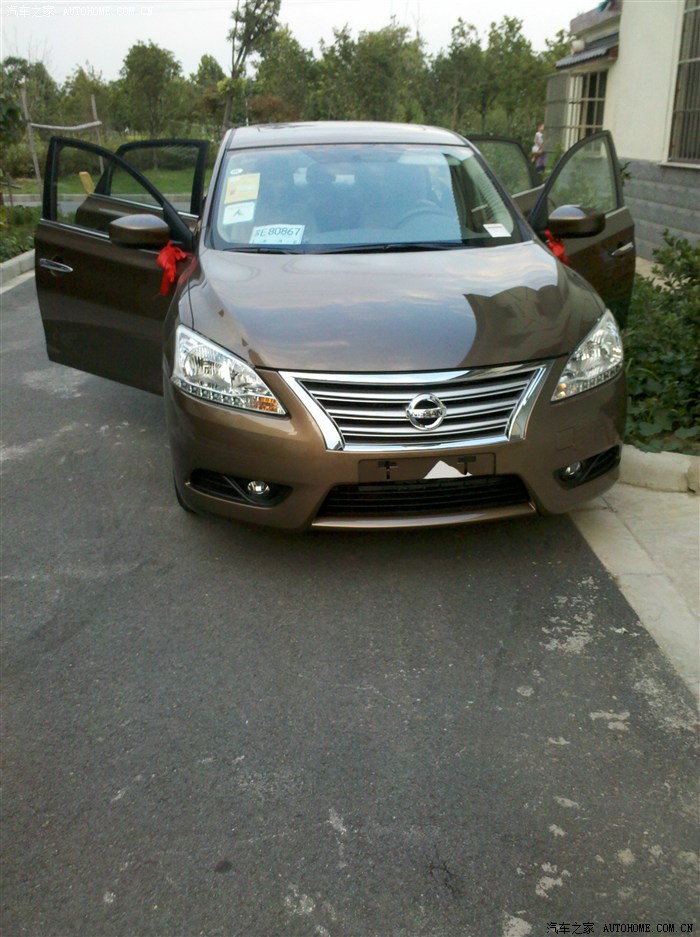 16自动豪华版钛古金轩逸提车作业