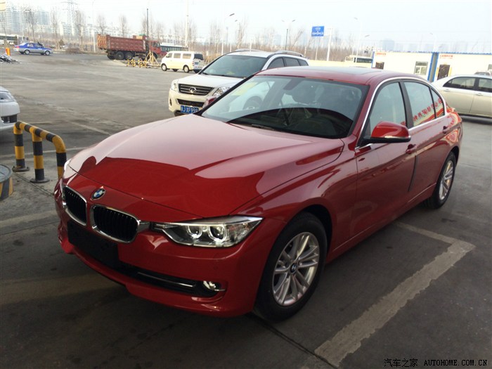 今天刚提的全新2014款宝马320li墨尔本红新疆克拉玛依90后